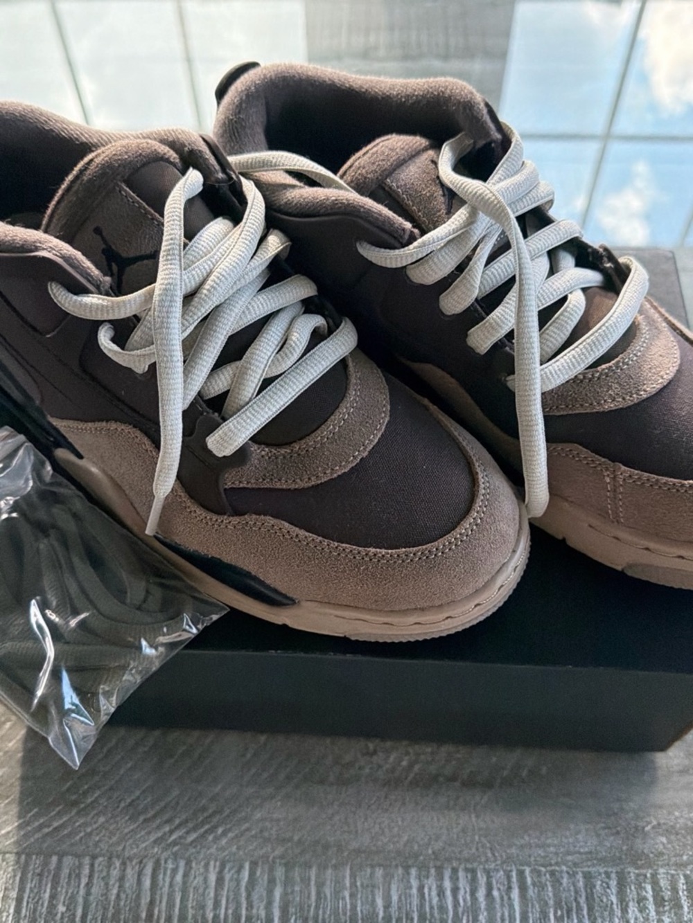 Air Jordan 4 RM Brown and Tan Low-Top Sneakers with White Laces